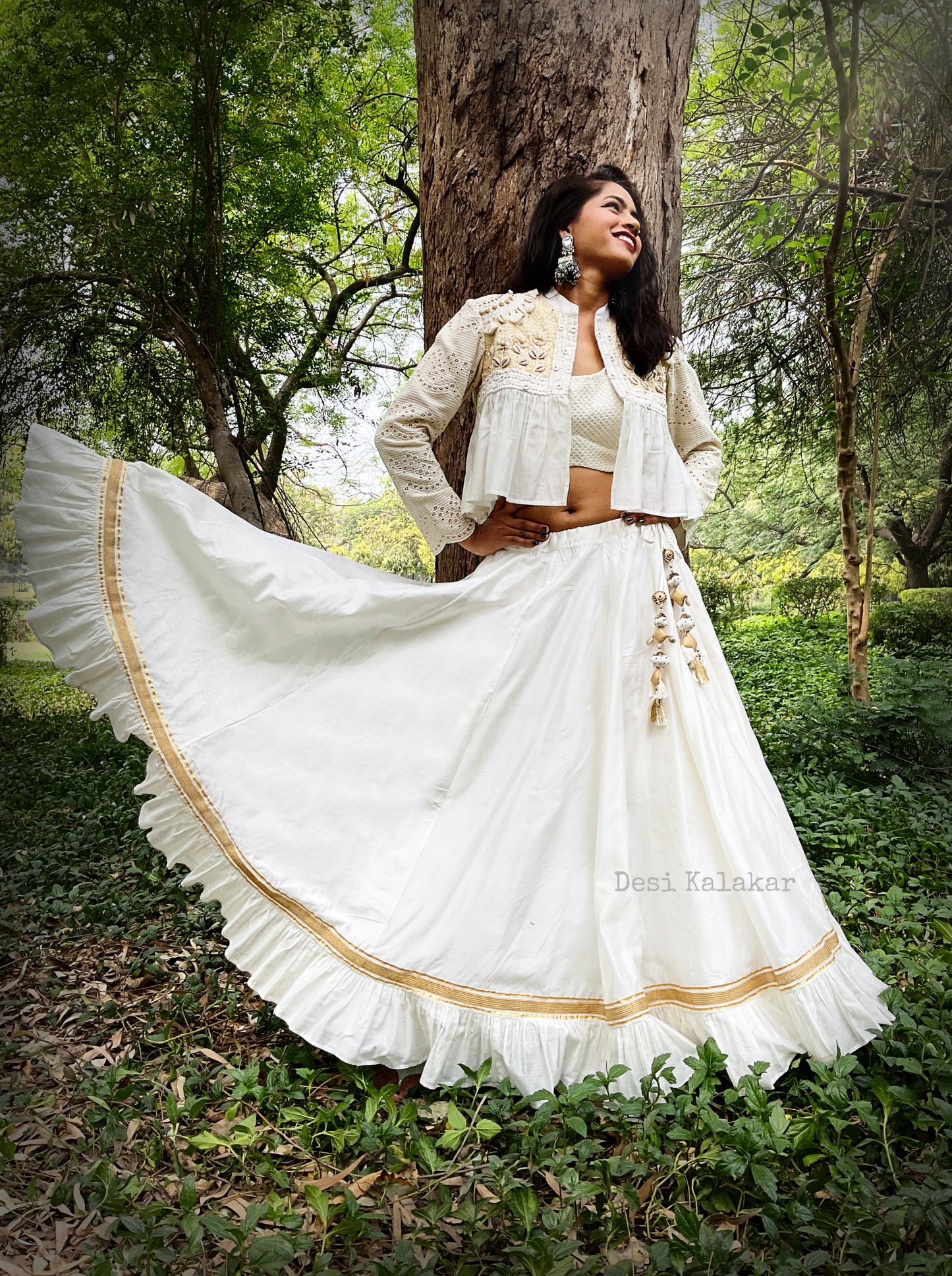 ‘The Ivory Garden’ Hand-embroidered Peplum Jacket Blouse and Lehenga Set