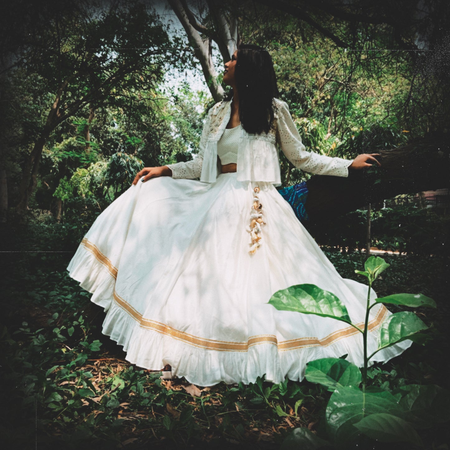 ‘The Ivory Garden’ Hand-embroidered Peplum Jacket Blouse and Lehenga Set